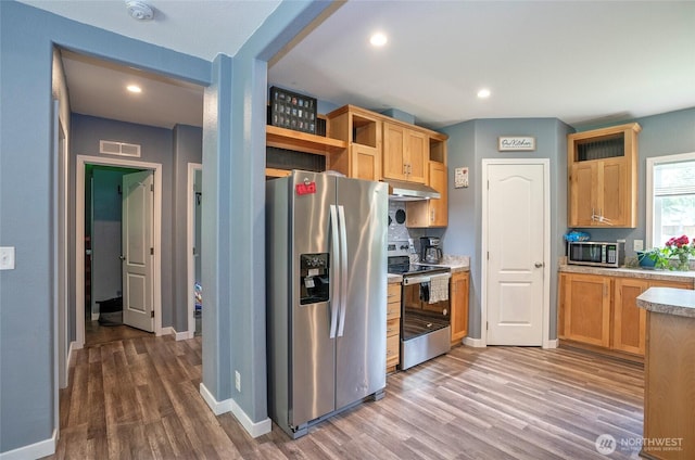 1332 SE Fireweed Rd, Shelton, WA 98584 - kitchen featuring stainless steel appliances, under cabinet range hood, wood finished floors, open shelves, and light countertops