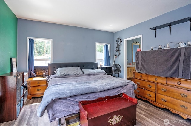 1332 SE Fireweed Rd, Shelton, WA 98584 - bedroom with wood finished floors and connected bathroom
