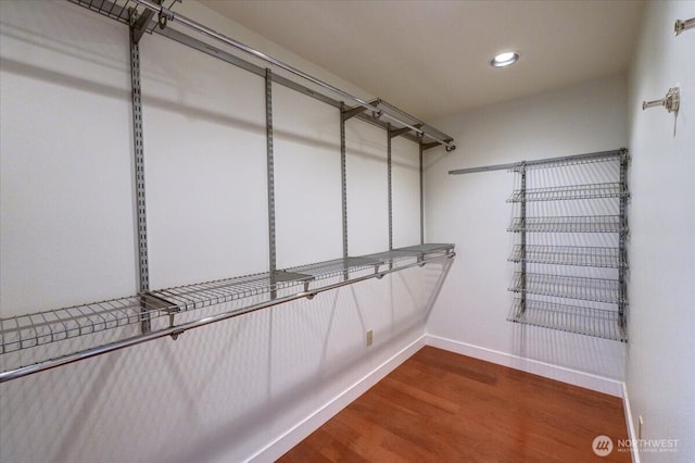 1 N Stadium Way Unit 16, Tacoma, WA 98403 - walk in closet featuring wood finished floors