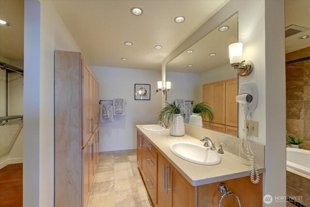 1 N Stadium Way Unit 16, Tacoma, WA 98403 - full bath featuring double vanity, a bath, and recessed lighting