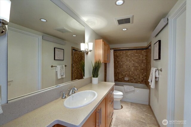 1 N Stadium Way Unit 16, Tacoma, WA 98403 - bathroom with toilet, vanity, recessed lighting, and shower / tub combo