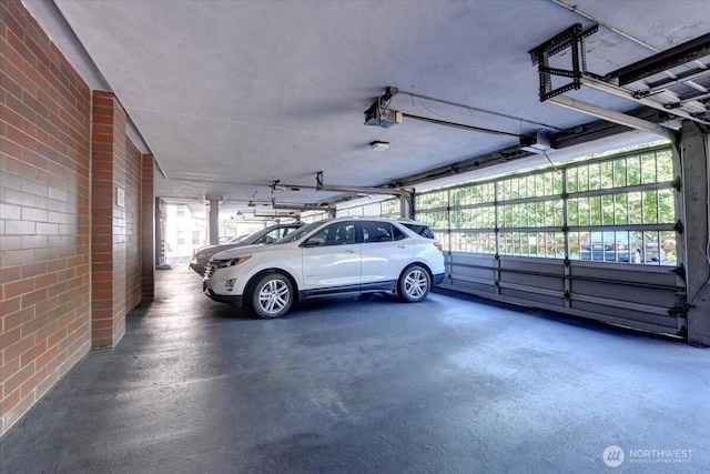 1 N Stadium Way Unit 16, Tacoma, WA 98403 - garage featuring a garage door opener