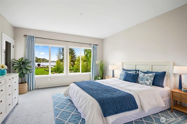 carpeted bedroom with baseboards