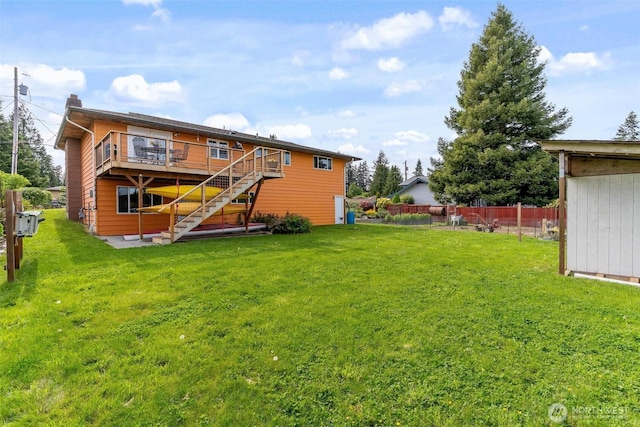 back of property with stairway and a wooden deck