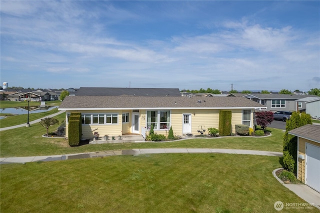 1701 E Burr Ave Unit 12, Moses Lake, WA 98837 - ranch-style home with a front yard and a residential view