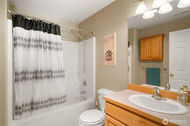 bathroom with shower / tub combo with curtain, visible vents, toilet, and vanity