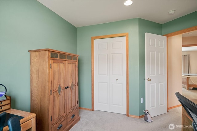 bedroom with recessed lighting, light carpet, and baseboards