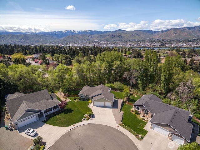 aerial view with a mountain view and a residential view