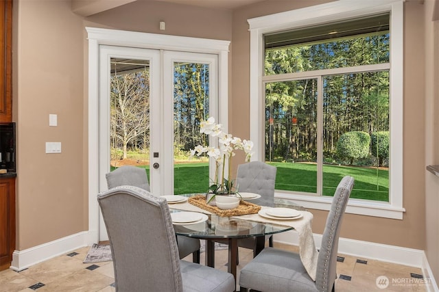interior space featuring baseboards