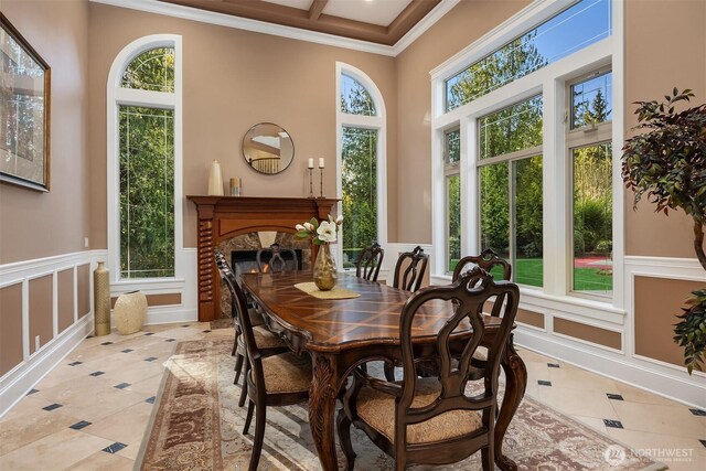 sunroom / solarium with a wealth of natural light, coffered ceiling, and beamed ceiling