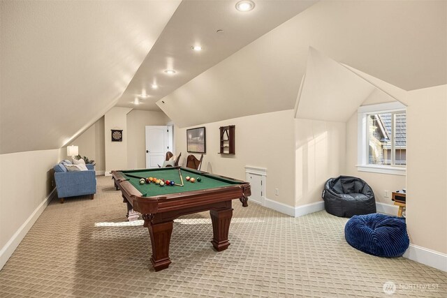 rec room with lofted ceiling, light carpet, baseboards, and pool table