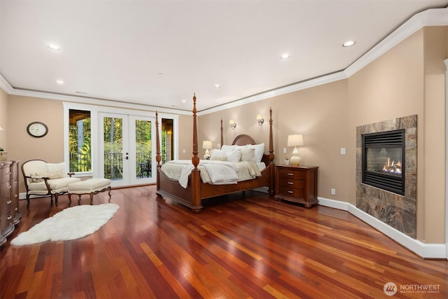 bedroom featuring french doors, wood finished floors, access to outside, and crown molding