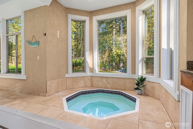 view of swimming pool featuring an indoor in ground hot tub