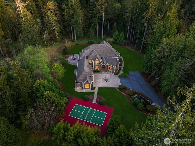 drone / aerial view with a view of trees