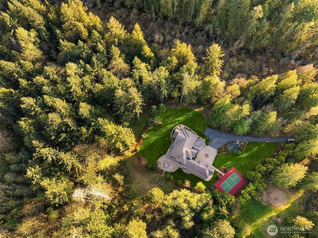 aerial view featuring a view of trees