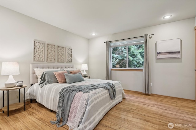 bedroom featuring recessed lighting and light wood-type flooring