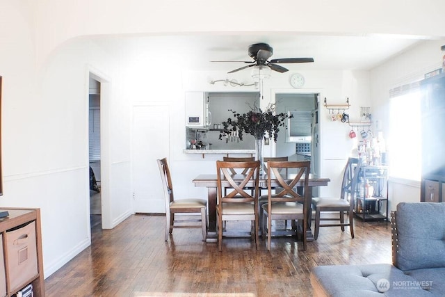 2916 Robin Ave, Bremerton, WA 98310 - dining area with baseboards, a ceiling fan, and wood finished floors