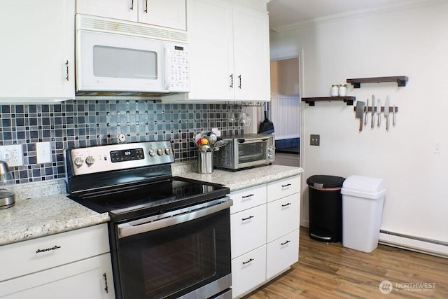 2916 Robin Ave, Bremerton, WA 98310 - kitchen featuring white cabinets, a toaster, stainless steel range with electric cooktop, white microwave, and crown molding