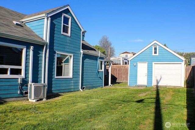 2916 Robin Ave, Bremerton, WA 98310 - view of yard featuring fence, an outdoor structure, ac unit, and a detached garage