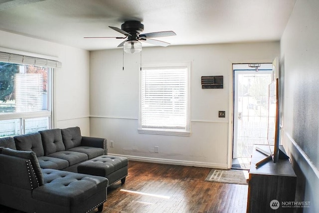 2916 Robin Ave, Bremerton, WA 98310 - living area with dark wood-type flooring, a ceiling fan, and baseboards