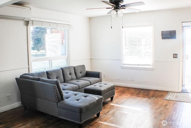 2916 Robin Ave, Bremerton, WA 98310 - living room with a wall mounted air conditioner, ceiling fan, baseboards, and wood finished floors