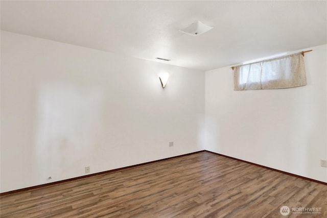 1315 Mill Ave, Bellingham, WA 98225 - below grade area with wood finished floors and baseboards