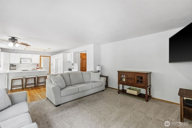 327 Keach Ct, Steilacoom, WA 98388 - living area featuring ceiling fan and baseboards