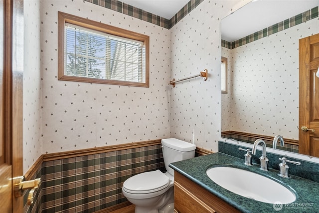327 Keach Ct, Steilacoom, WA 98388 - bathroom featuring wallpapered walls, toilet, and vanity