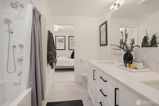 full bath with connected bathroom, double vanity, toilet, shower / tub combo with curtain, and baseboards
