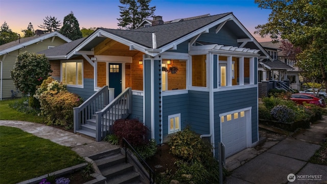 119 37th Ave E, Seattle, WA 98112 - bungalow-style house featuring a chimney, roof with shingles, and a garage