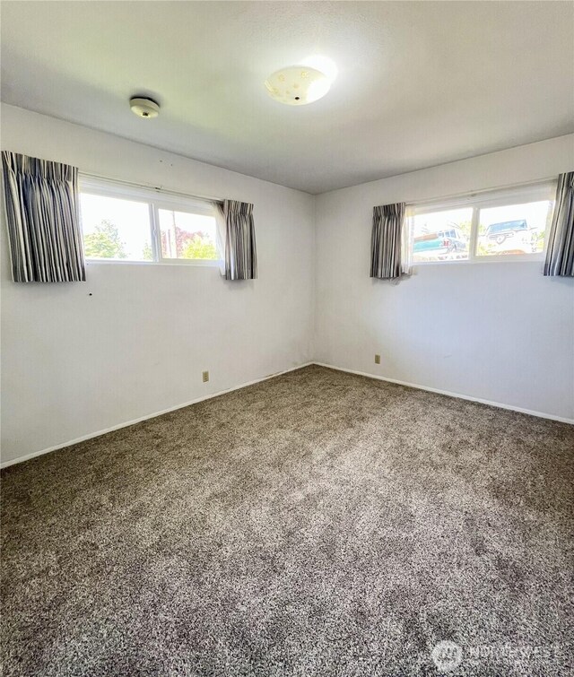 2116 Cascade Way, Longview, WA 98632 - empty room featuring healthy amount of natural light and carpet
