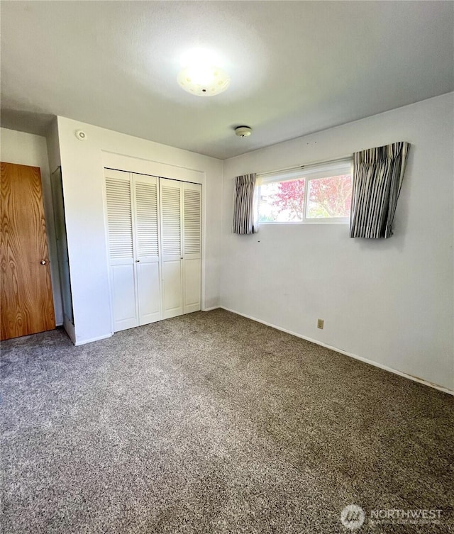 2116 Cascade Way, Longview, WA 98632 - unfurnished bedroom featuring a closet and carpet flooring