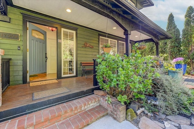 property entrance featuring covered porch