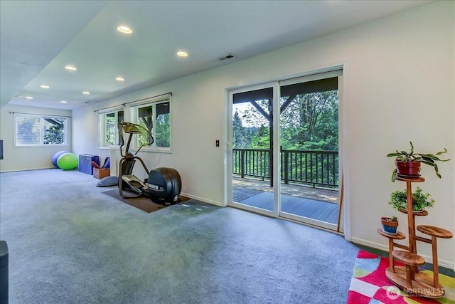 exercise room featuring carpet, baseboards, and recessed lighting