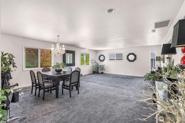 4353 Gooding Ave, Bellingham, WA 98226 - dining space with an inviting chandelier, baseboards, dark colored carpet, and visible vents