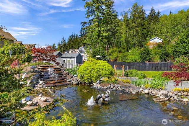 4353 Gooding Ave, Bellingham, WA 98226 - water view featuring fence and a garden pond
