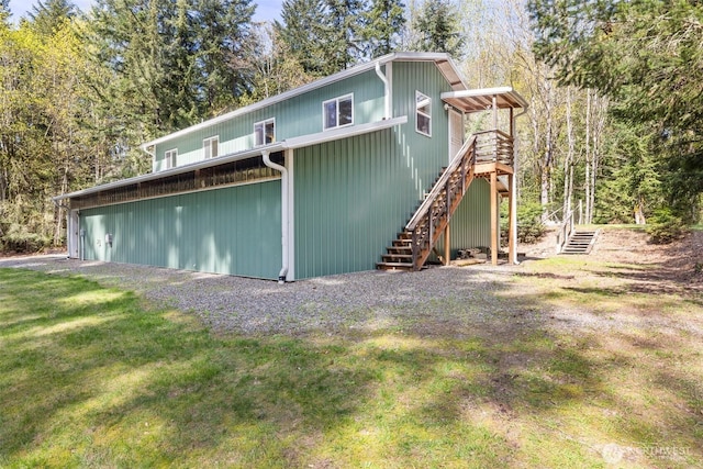 212 Deer Park Ln, Port Angeles, WA 98362 - back of house featuring a deck and stairway