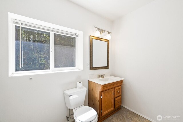 212 Deer Park Ln, Port Angeles, WA 98362 - half bath with toilet, baseboards, and vanity