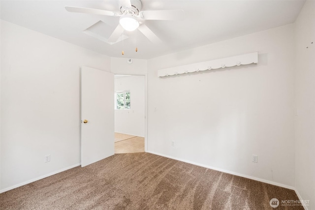 212 Deer Park Ln, Port Angeles, WA 98362 - carpeted empty room featuring a ceiling fan and baseboards