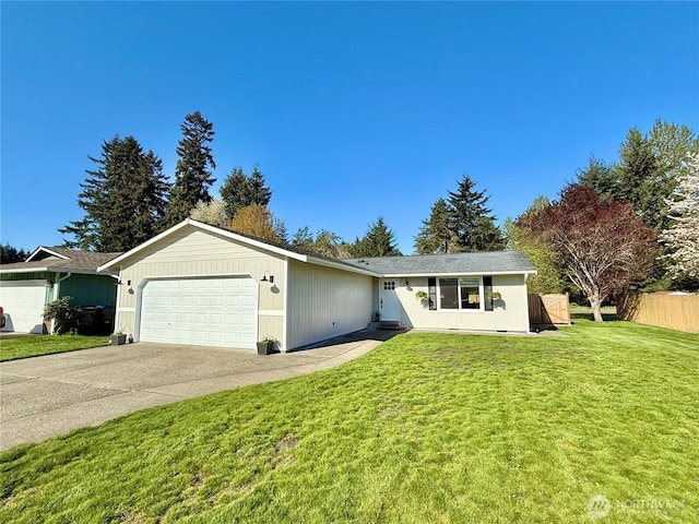 4713 Stikes Dr SE, Lacey, WA 98503 - ranch-style house with a front lawn, driveway, fence, and a garage