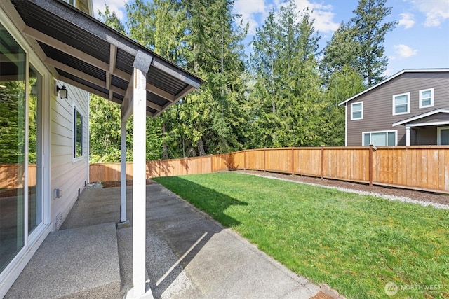 view of yard featuring a fenced backyard and a patio area