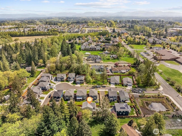 aerial view featuring a residential view and a mountain view
