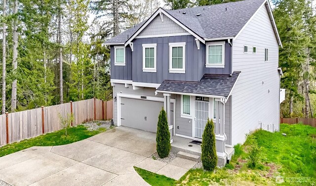 19825 152nd Street Ct SE, Bonney Lake, WA 98391 - traditional home featuring an attached garage, fence, roof with shingles, and board and batten siding