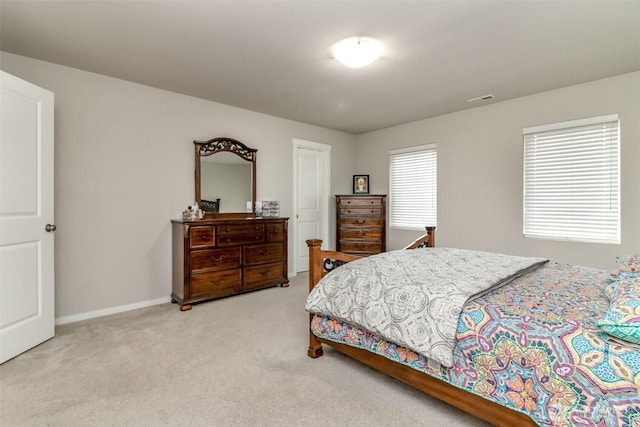 19825 152nd Street Ct SE, Bonney Lake, WA 98391 - bedroom featuring baseboards, visible vents, and carpet