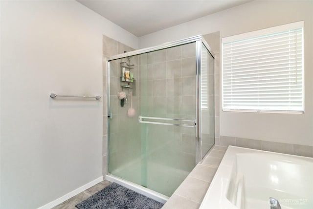 19825 152nd Street Ct SE, Bonney Lake, WA 98391 - bathroom with a bath and a stall shower