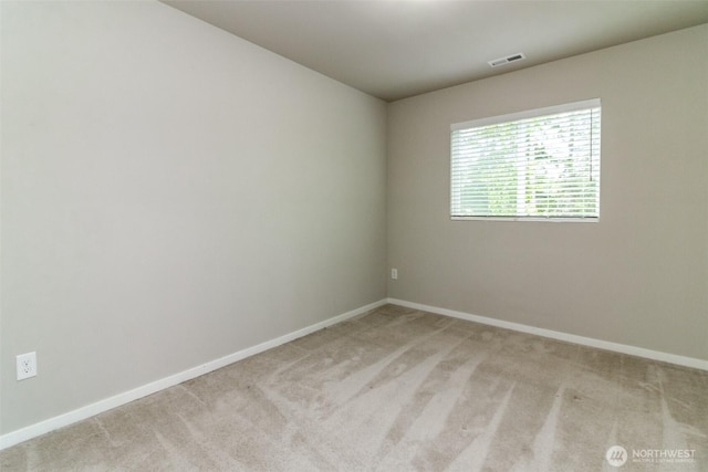 19825 152nd Street Ct SE, Bonney Lake, WA 98391 - spare room featuring baseboards, visible vents, and carpet flooring