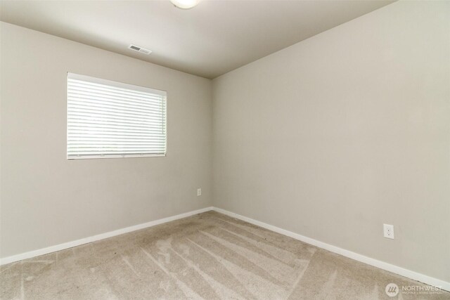 19825 152nd Street Ct SE, Bonney Lake, WA 98391 - empty room featuring visible vents, baseboards, and light carpet