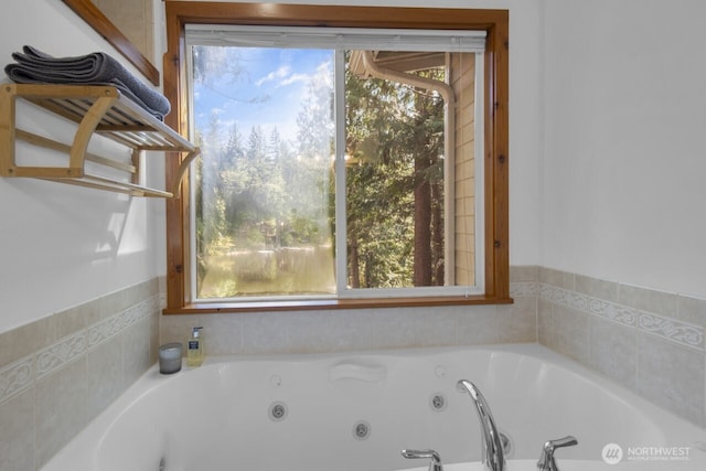full bathroom featuring a whirlpool tub