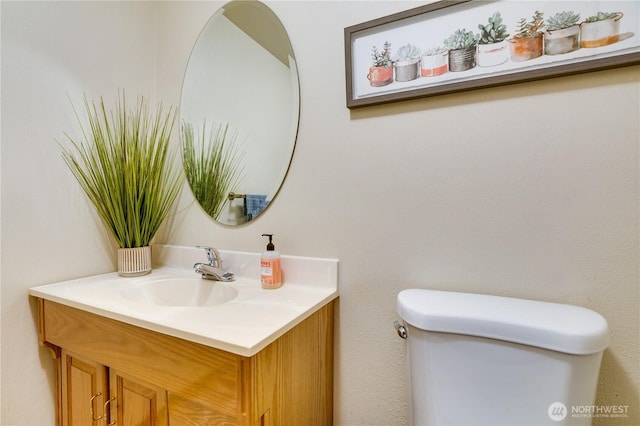 half bath with toilet and vanity