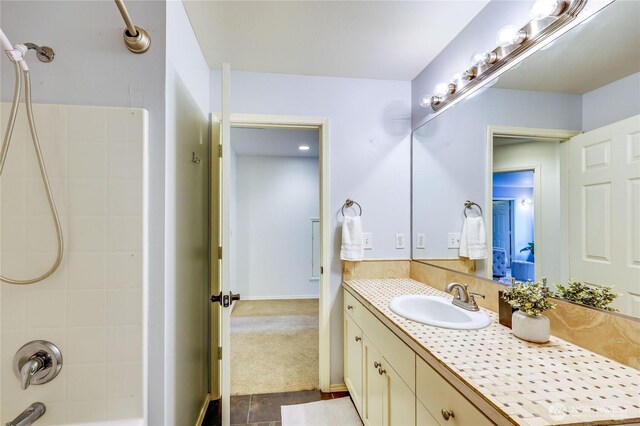 full bath featuring shower / bathing tub combination and vanity